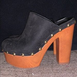 Black and brown clogs